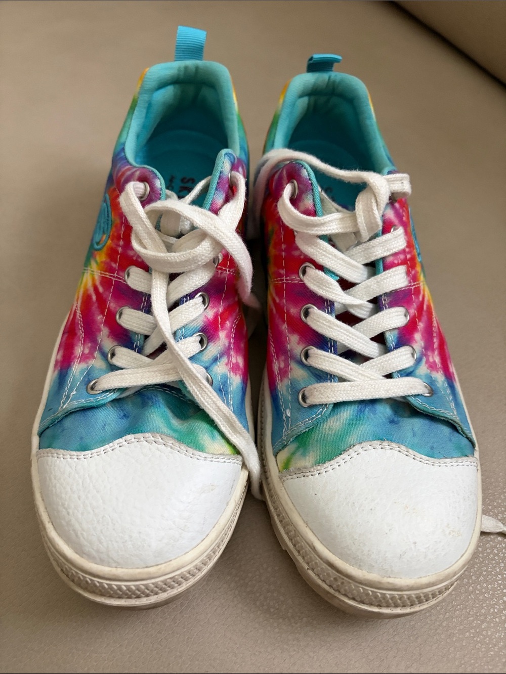 Skechers tie-dye sneakers. Used but no holes